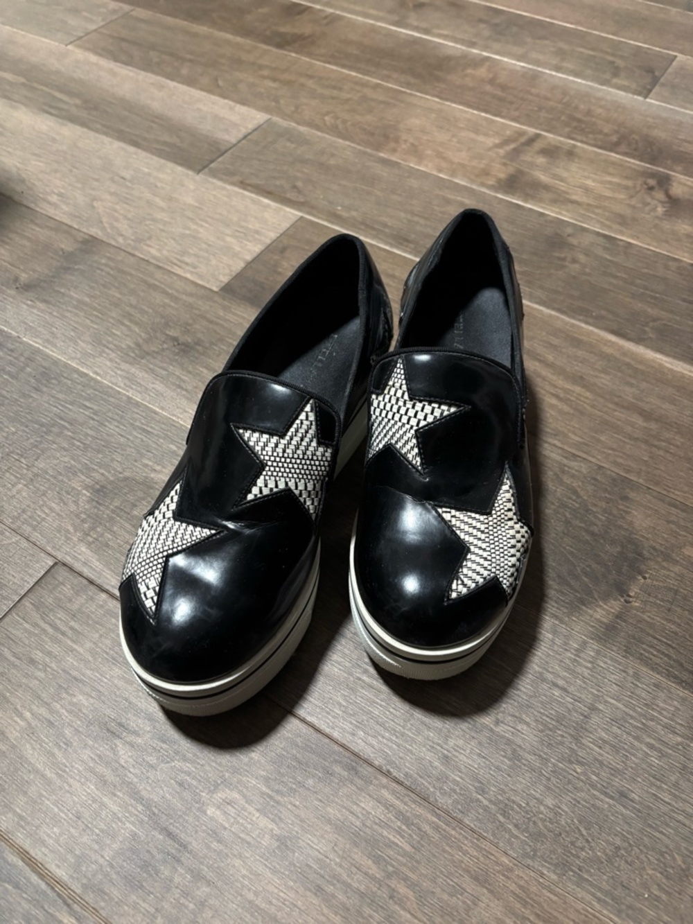 Stella McCartney Black Platform Slip-On Sneakers with White Star Accents